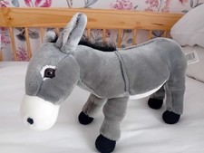 Grey plush toy donkey with