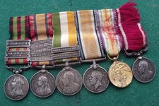 PERIOD MINIATURE VICTORIAN INDIA, BOER QSA, KSA, WWI LSGC MINIATURE MEDAL GROUP.