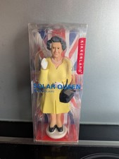 Kikkerland Waving Queen Solar Powered Yellow Coloured Dress