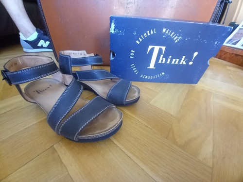 Think black leather sandals - think,