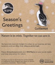 RSPB Pin Badge NIIC Christmas Special Guillemot with cracker hat P03200