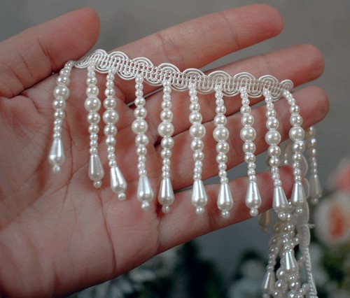 Dangling ivory tassel beaded - ivory,