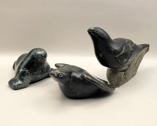Three small inuit - three,
