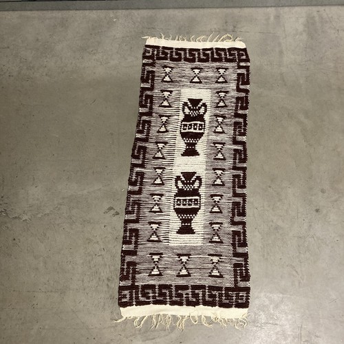 Woven rug peruvian - style, jug
