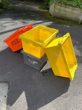 A3 size stackable storage crates, some with integrated lids