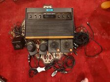Atari 2600 Woody Six Switch Console with Asteroids, Controllers, & Original Box
