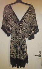 NWOT sz 16-18 Gorgeous knee length dress low neckline and tassell ties & sequins