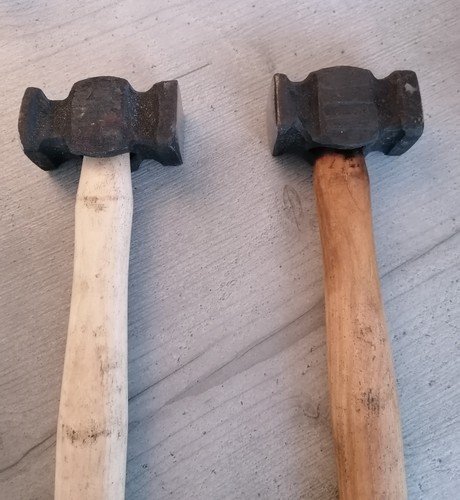 Pair double headed hand - of,