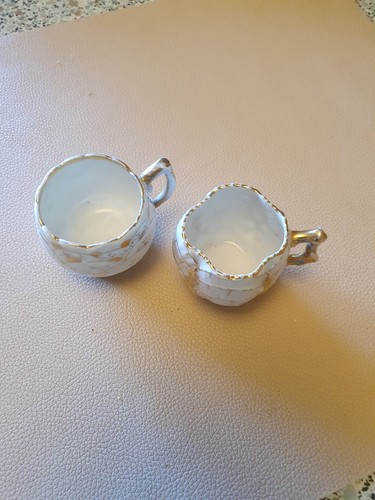 Two miniature cups possibly - miniature,