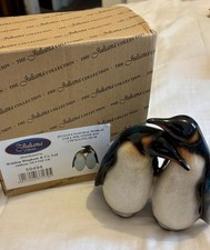 Penguins Figurine By The