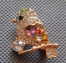 Vintage style bird brooch with stunning inset faux diamonds. New without tags.