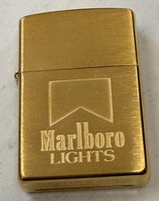 ZIPPO 1997 MARLBORO LIGHTS BRASS LIGHTER UNFIRED IN BOX K127
