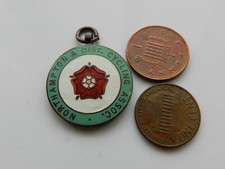 VINTAGE ENAMEL MEDAL/FOB, NORTHAMPTON & DISTRICT CYCLING ASSOC. D. JORDAN. 1957