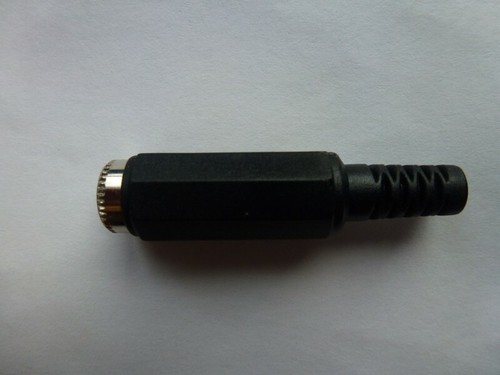 Socket for coil connector