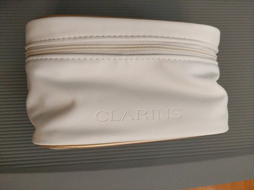 Clarins makeup bag cream - clarins,