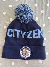 Manchester City Pom Pom Beanit Adult Unisex. Official Licensed Product of MCFC