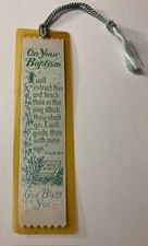 A VINTAGE WOVEN BOOKMARK WITH