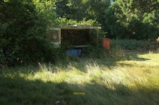 Photo 6x4 Abandoned milk