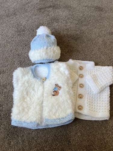 Baby hand knitted gilet faux - hand,