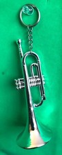 5" long PLASTIC TRUMPET   KEY RING - VERY GOOD USED CONDITION
