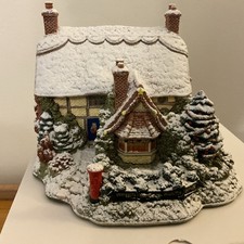 Lilliput Lane Cottages make light of the snow