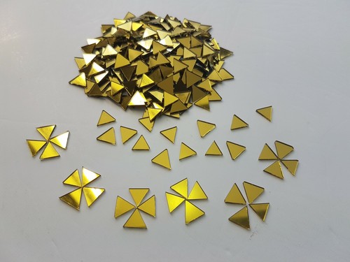 100 pieces gold triangle - 100,