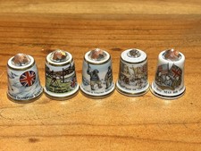 5 China Thimbles adorned with