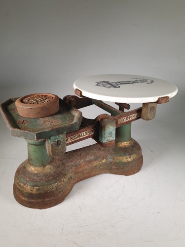 Cast iron scales with a - with,