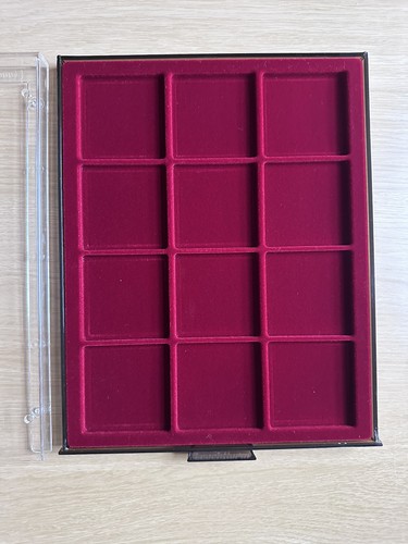 One empty used lindner trays - lindner,