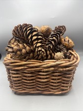 Large elongated pine cones in rustic woven basket: fireplace, crafts, home decor