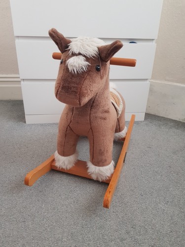 Wooden brown plush rockinv