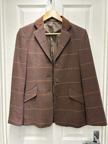 Brown tweed showing - tweed,