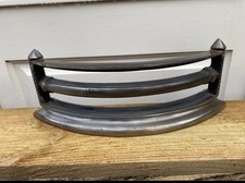 Reproduction cast iron fire grate front