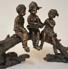 Resin Children Reading On A
