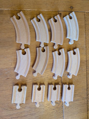 Wooden train track pieces - train,
