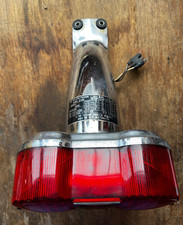 Tail light including holder