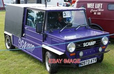 PHOTO  Q973ATV 1985 MINI SCAMP  CLASSIC CARS AND BUSSES AT THE RALLY. THE INCRED