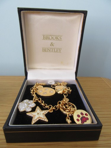 Brooks bentley gold tone paw - bentley,