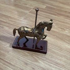 antique brass carousel horse
