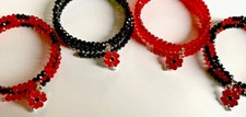 Poppy Charm on Beaded Memory Wire Bracelet. Adjustable. 4 Colours available