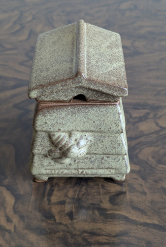 Pottery honey pot with - honey,