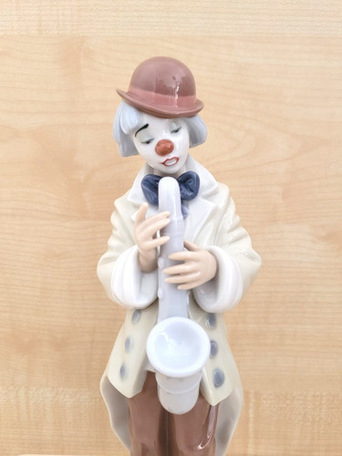 Lladro sad sax - clown, porcelain