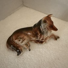 Vintage Laying down Collie dog