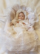 Vintage porcelain baby doll Musical (Rare) with wicker cot