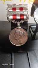 Indian Mutiny Medal Victorian  Lucknow medal with relief of Lucknow clasp.