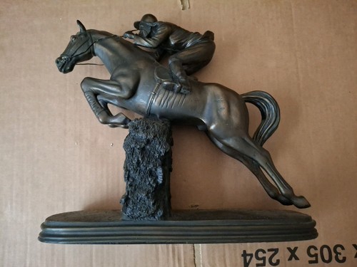 Horse and jockey - jumping, over