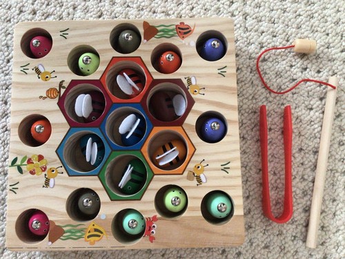 Wooden fishing game with fish - with,