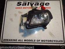 HONDA CBR 1000 RR FIREBLADE 2006 2007:PART OF HEADLIGHT - LEFT (DAMAGED):USED