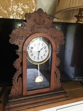 early 1900s ansonia american gingerbread clock converted to quartz movement