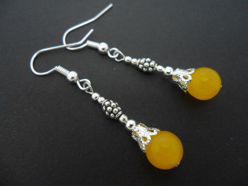 Pair yellow jade dangly - a, of